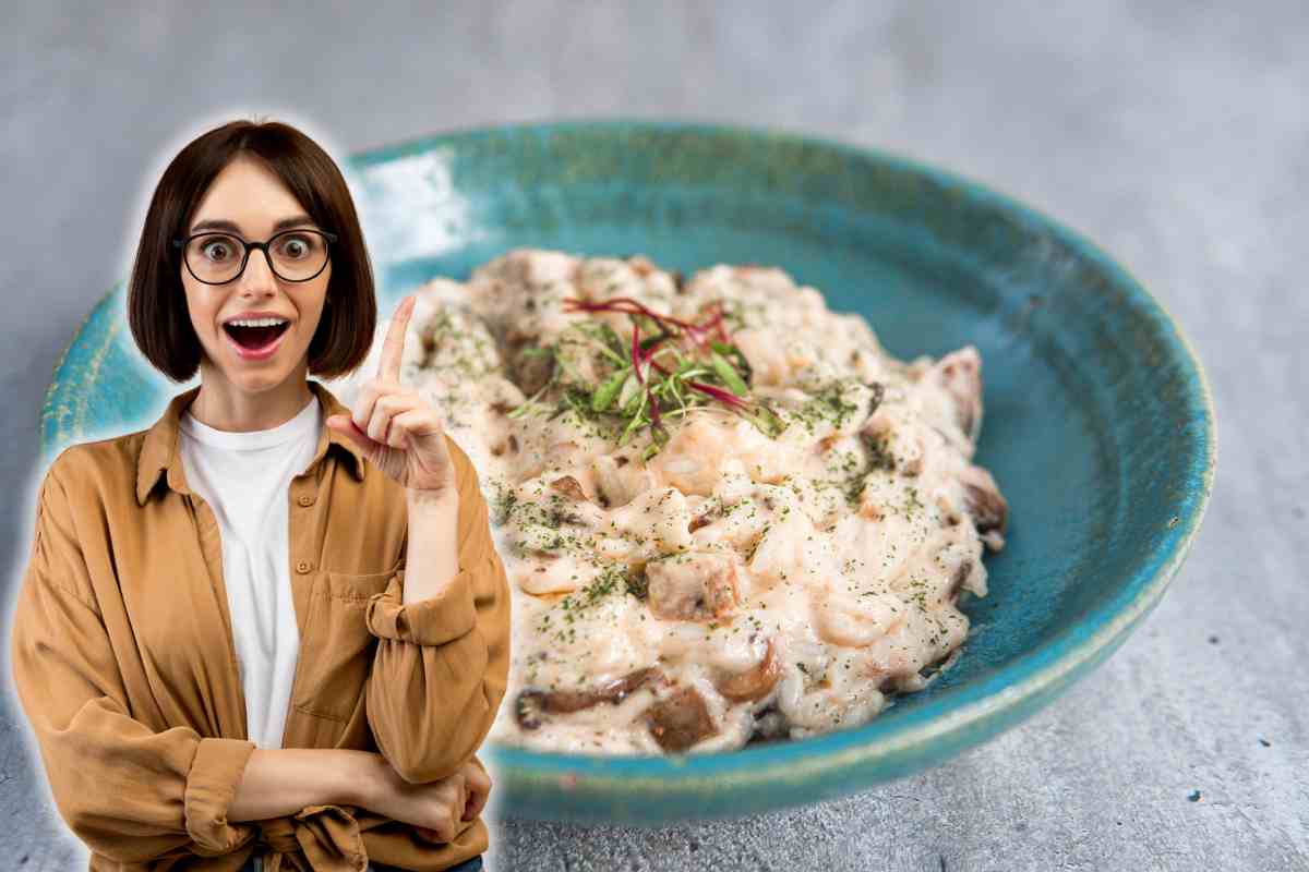 donna con risotto di pesce