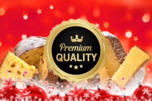 pandoro e panettone come sfondo e in primo pianto etichetta che indica buona qualità