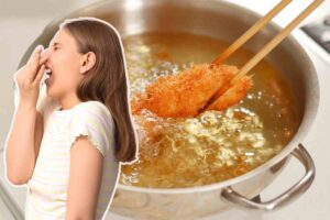 Donna che avverte puzza di frittura