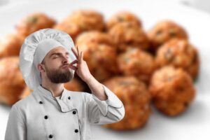 polpette fritte in piatto e chef che manda bacio